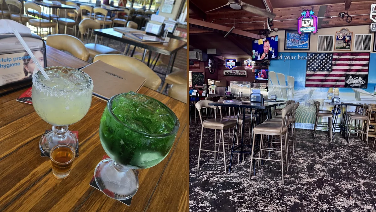 Sports bar dining area with TVs.