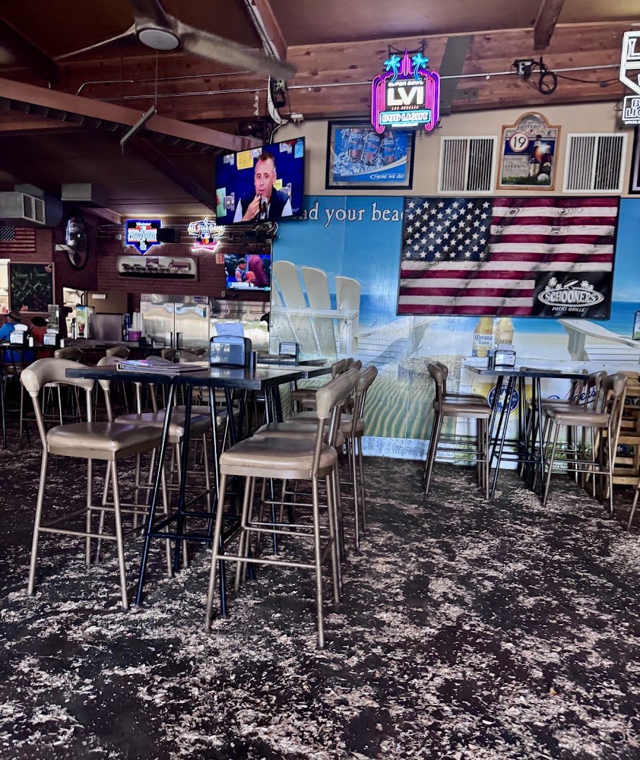 Bar and grill with patio seating.