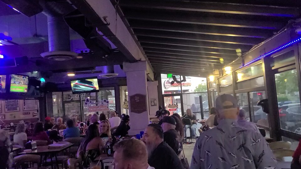 Patio tables with casual bar seating.